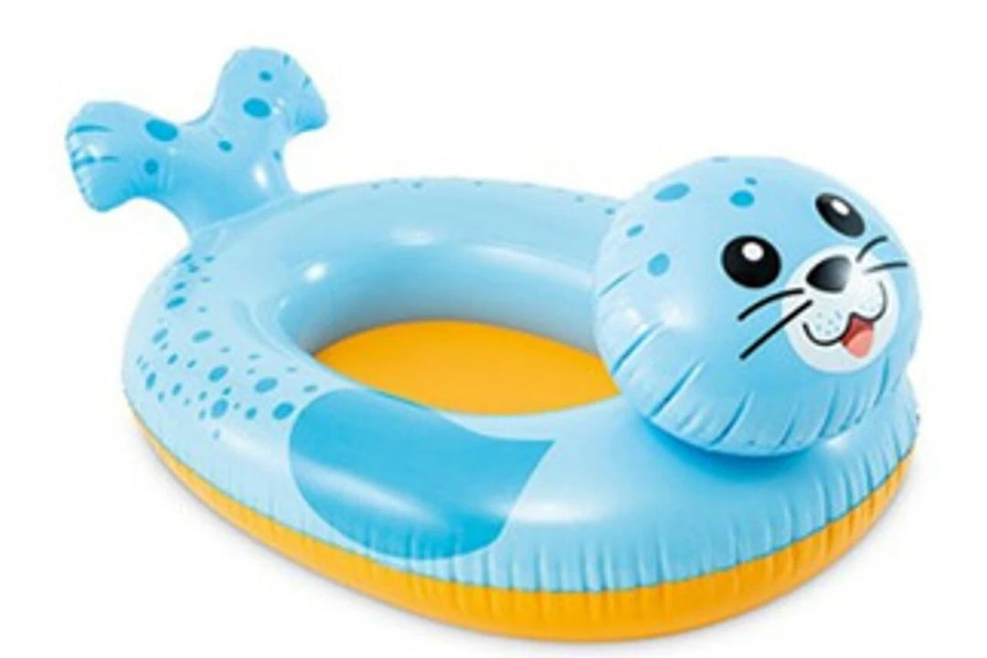 A blue and yellow inflatable pool float shaped like a seal, featuring a smiling seal face on the side and a small fish tail at the back, shown on a plain white background.