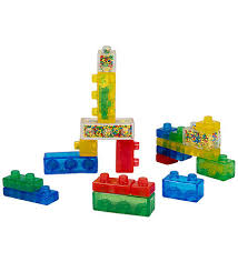 A set of colorful plastic building blocks arranged on a plain white background.