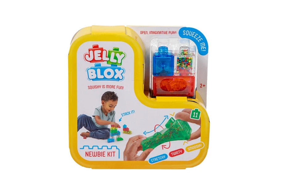 Jelly Blox Squeezie Flash Newbie Kit in its original yellow and white packaging, containing a squeeze box with blue and red translucent jelly pieces.