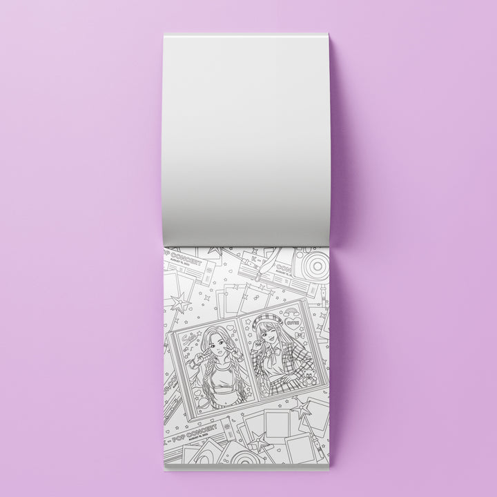 A notebook with a blank white top cover and a patterned bottom cover featuring black line-art illustrations of two women, shown on a solid lavender background.