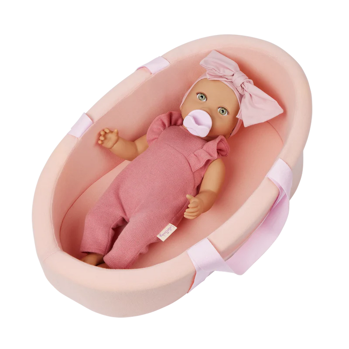 LullaBaby Doll and Carrier Bassinet Baby doll in a pink bathtub with a pacifier on a white background