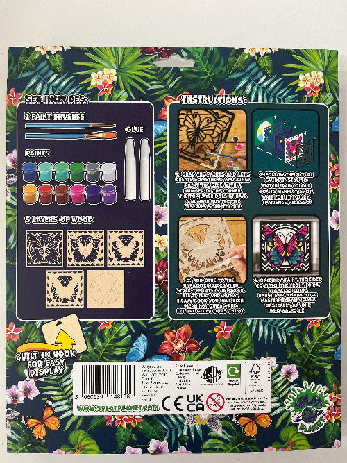 Artistic craft kit packaging with tropical design, tools, and materials.