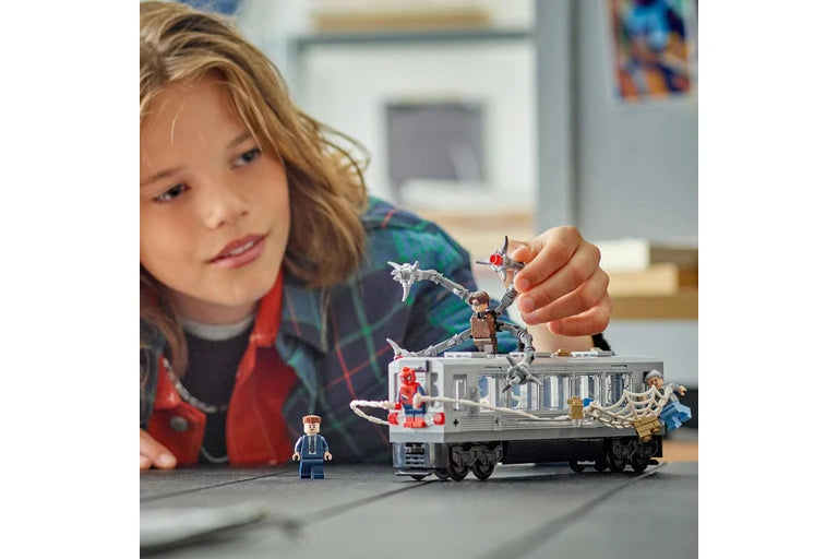 LEGO Spiderman vs Doc Ock Subway Train Scene 76321 child playing