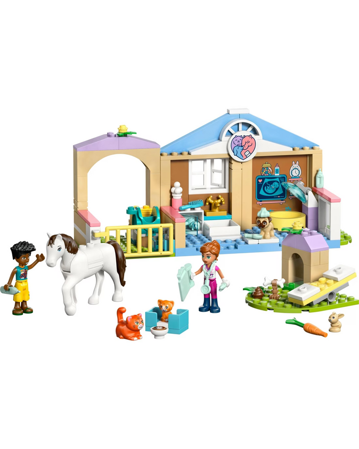 LEGO set with a veterinarian's office, animals, and a horse on a white background
