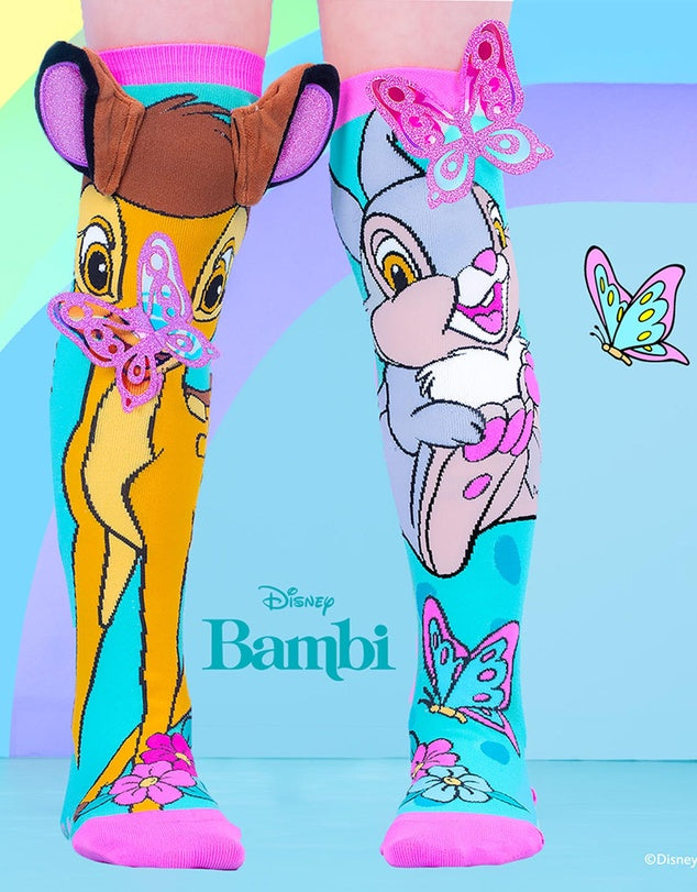 Colorful socks with cartoon characters on a blue background