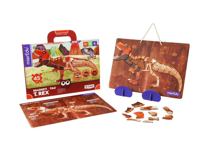 Dinosaur-themed magnetic pad set with packaging on a white background