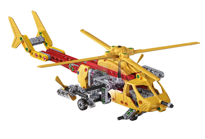 A yellow and red building block toy helicopter with gray wheels and details, shown on a plain white background.