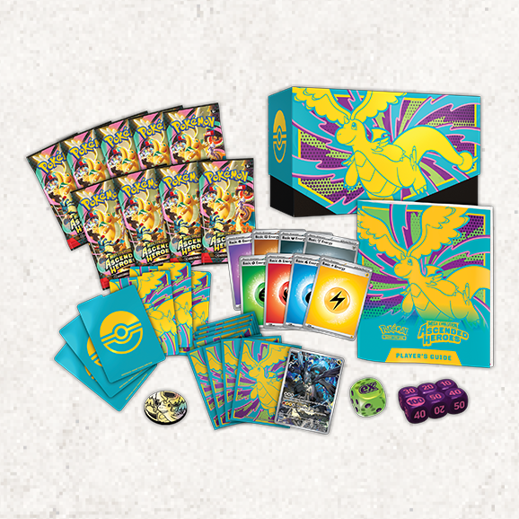 Collection of Pokémon trading cards and accessories on a light gray background