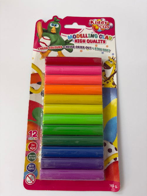 Pack of colorful modeling clay sticks with packaging on a white background