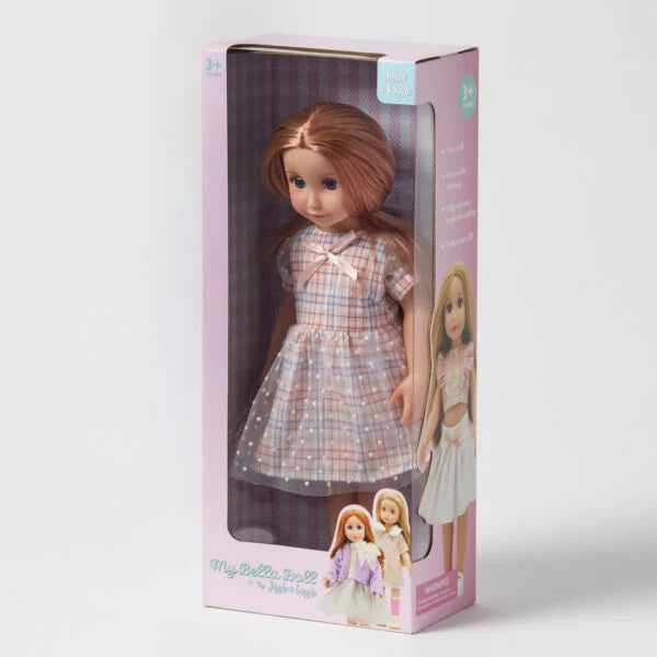 Gabriella doll wearing pink dress inside pink packaging