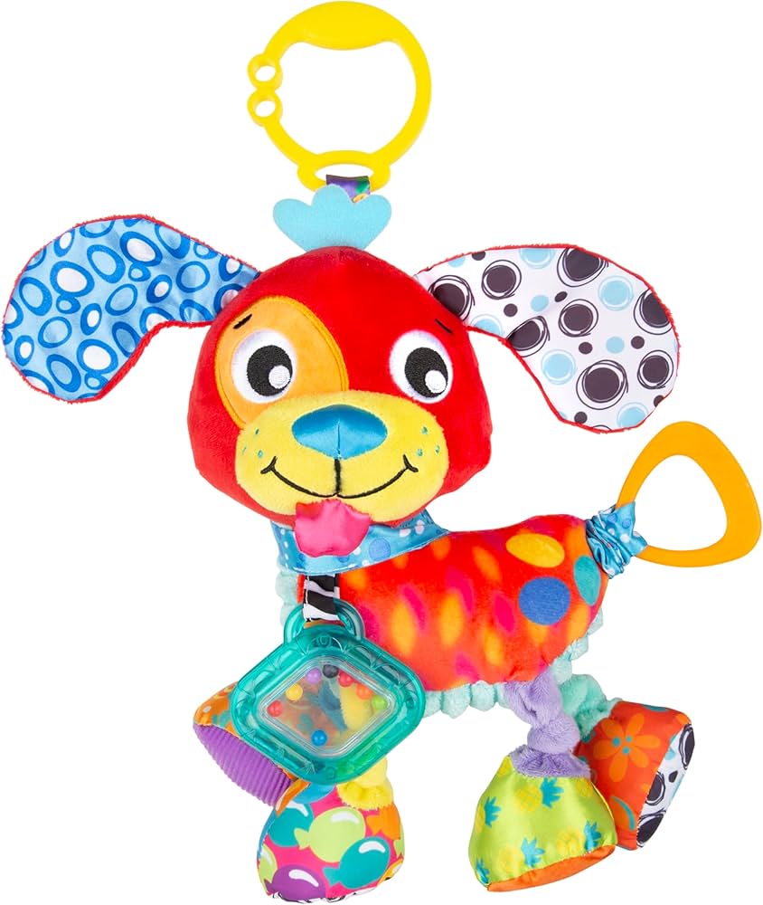 Colorful baby toy shaped like a dog with various textures and handles on a white background