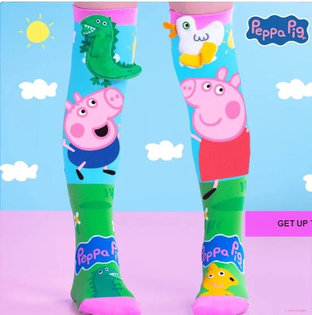 Colorful socks with Peppa Pig characters on a blue background