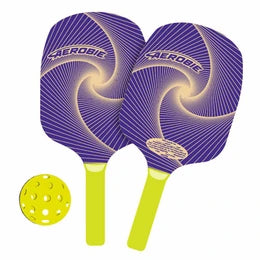 Two purple and green Aerobie sports paddles with a yellow ball on a white background
