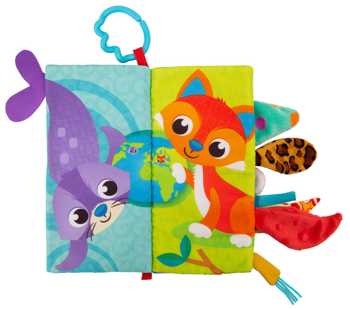 A colorful baby sensory book with plush animal tabs, featuring a purple cat on the left and an orange fox on the right, with a blue ring pull at the top and red, yellow, and green accents.