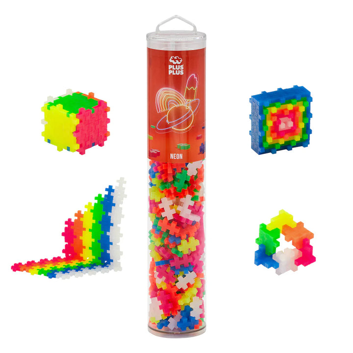 Neon plus plus puzzle pieces in a cylindrical tube with Plus-Plus branding, surrounded by assembled puzzles.