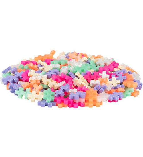 Plus plus Pearl 100 pieces Colorful interlocking brick building set on a white background