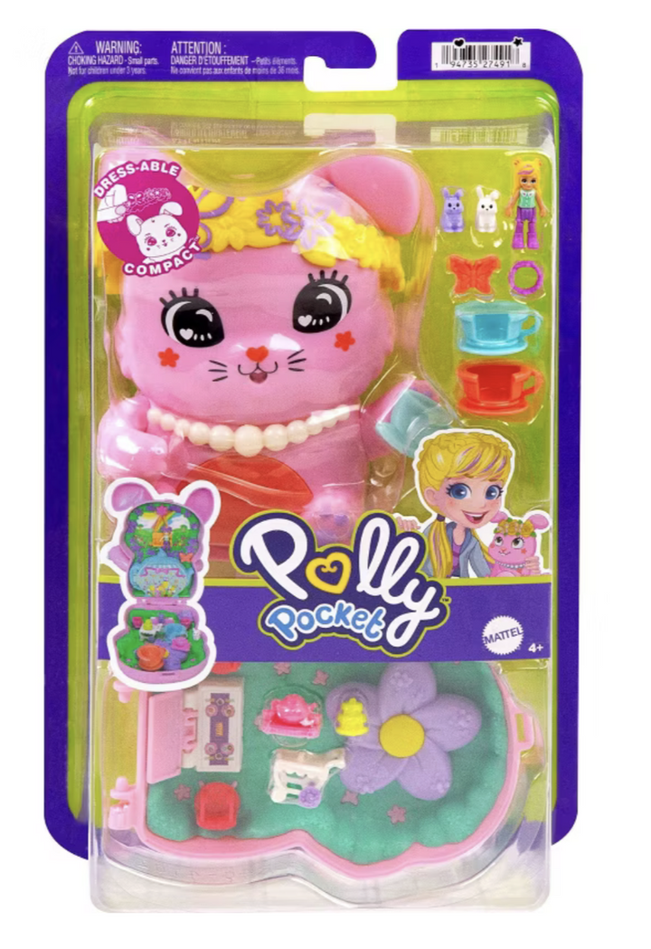 Pink toy with accessories in packaging, featuring the brand 'Polly Pocket'.
