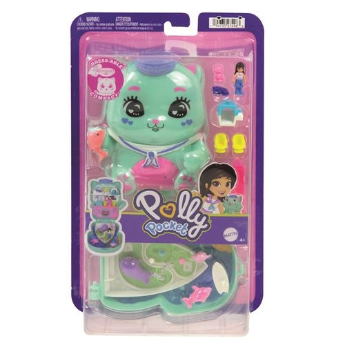 Polly Pocket toy figure in packaging with accessories on a white background