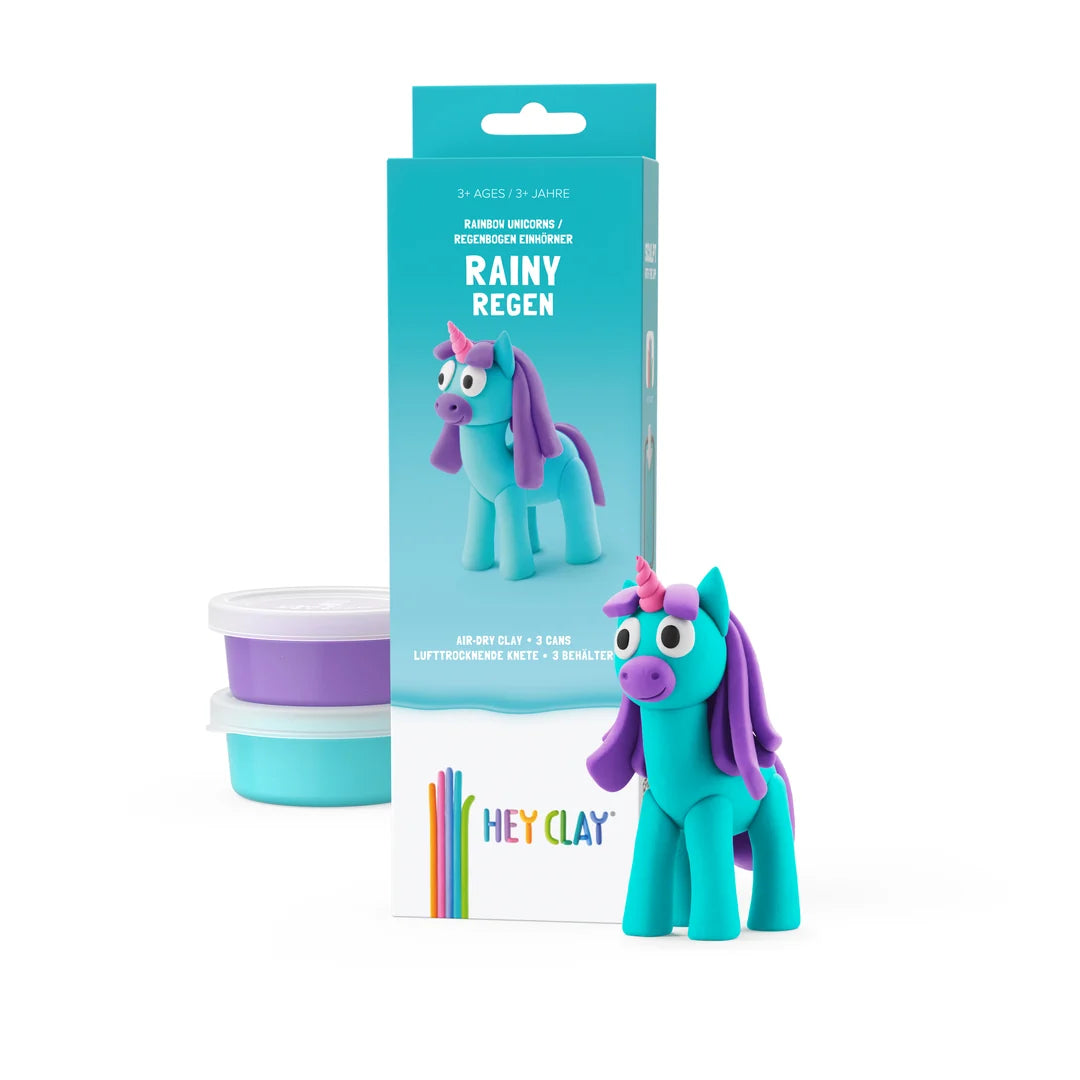 hey clay rainy blue packaging next to hey clay pots and hey clay rainy unicorn