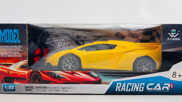 Model racing car in packaging with visible text and branding