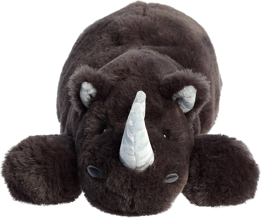 Plush toy resembling a rhinoceros on a white background