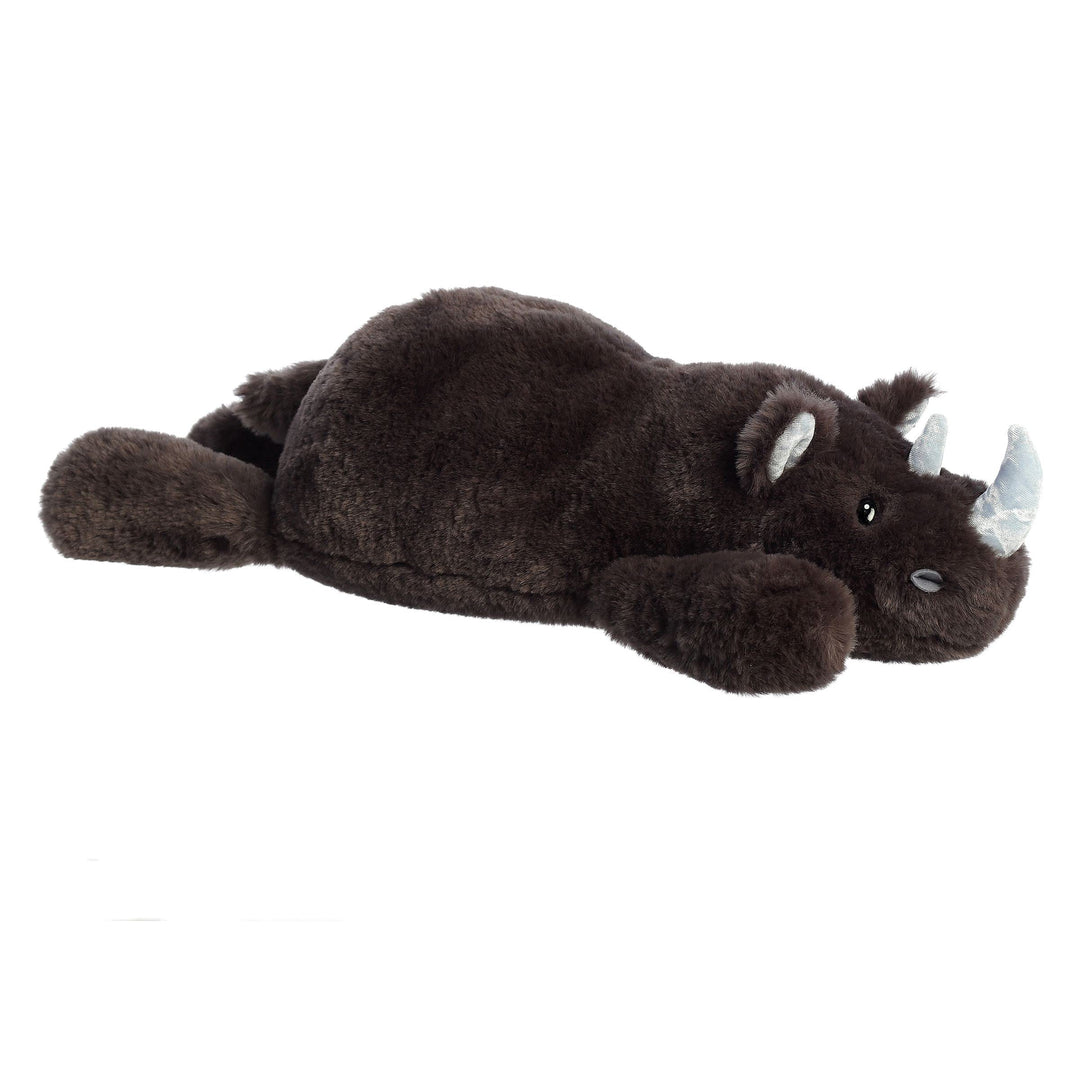 Plush toy resembling a rhinoceros on a white background