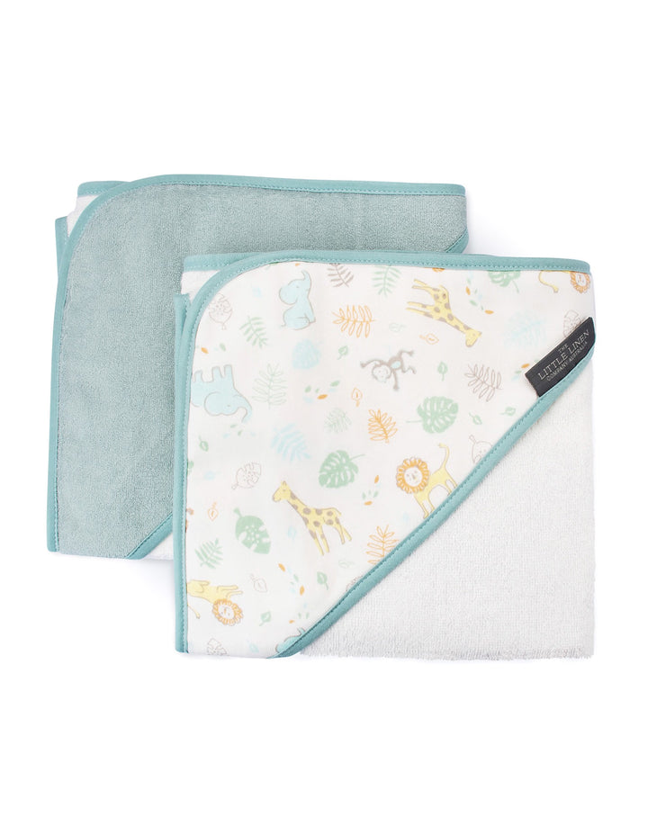 Two folded baby hooded towels on a white background. One towel is solid light aqua, and the other has a white background with a light aqua border and a safari animal print in pastel blue, yellow, and green.