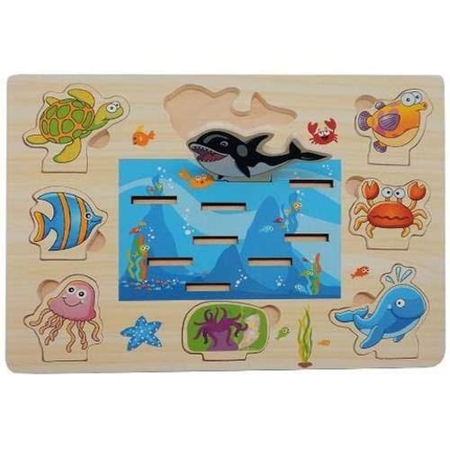 A wooden children's puzzle board featuring an underwater theme with colorful animal pieces including a shark, turtle, fish, crab, octopus, whale, and starfish around a blue ocean scene.