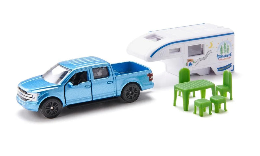 blue ford pickup truck with camping attachment and green table wear on a white background