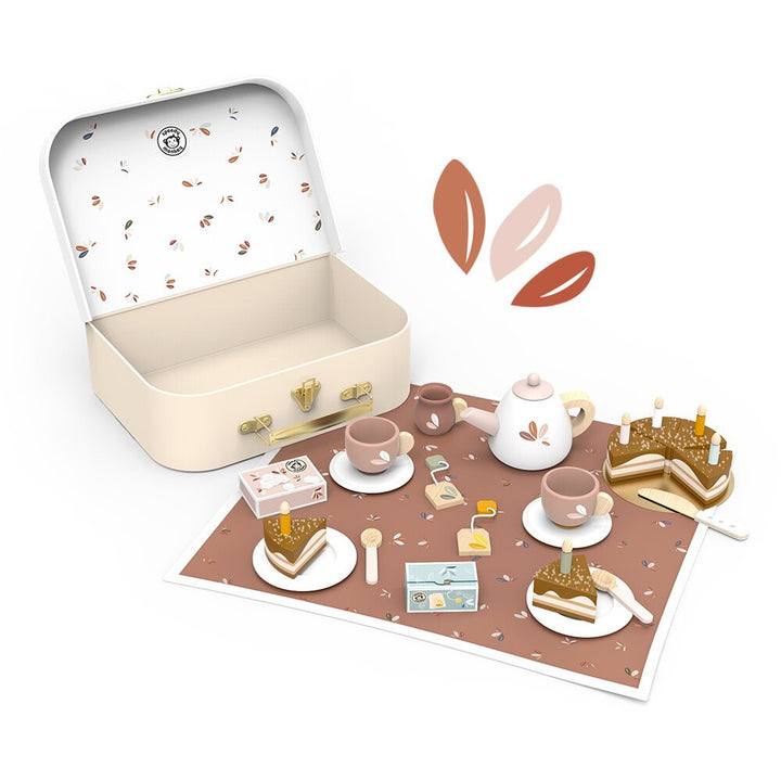 Miniature tea set with a suitcase on a white background