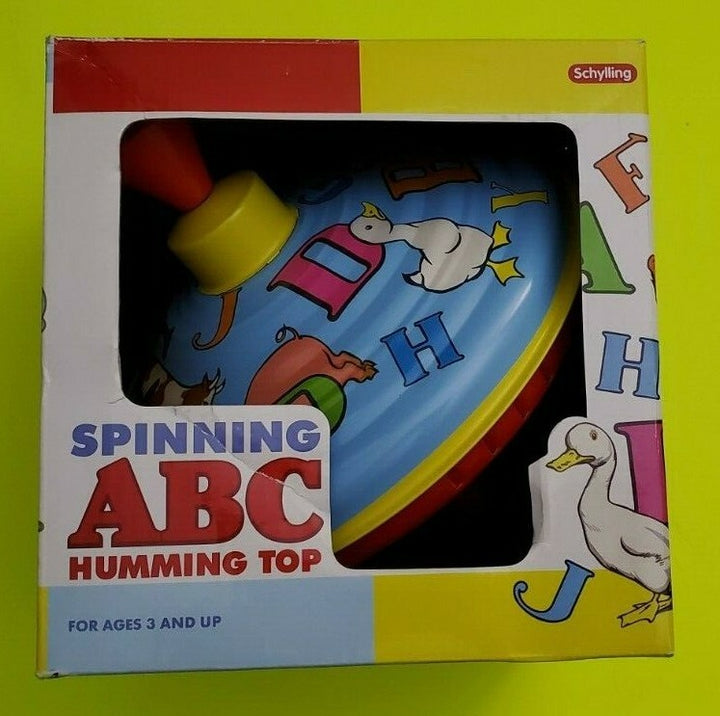 spinning ABC humming top in packaging