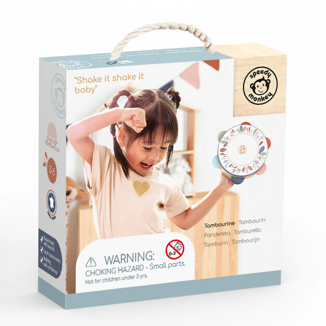Box of a tambourine with a child playing and the brand 'Speedy Monkey' visible.