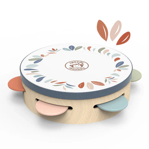 Children's tambourine with colorful design on a white background