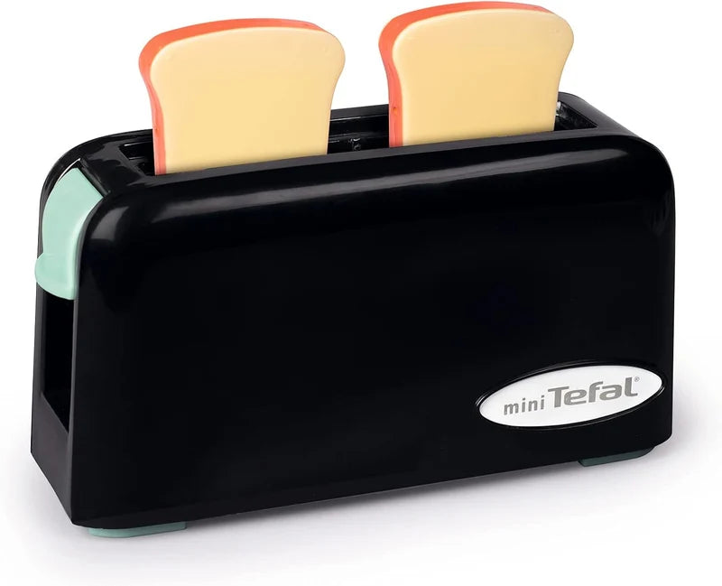 black toaster with two pieces of toy bread popping out of the top 