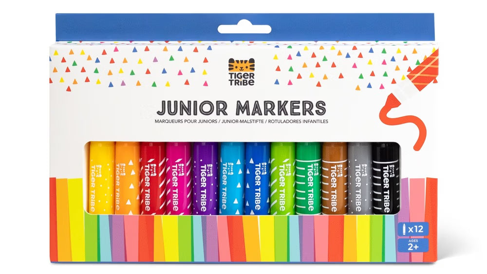 markers ranging from all the colors in the rainbow in white tiger tribe packaging on a white background