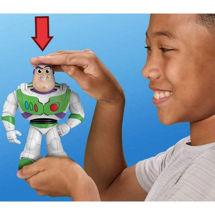 Child holding a Buzz Lightyear toy with a blue background