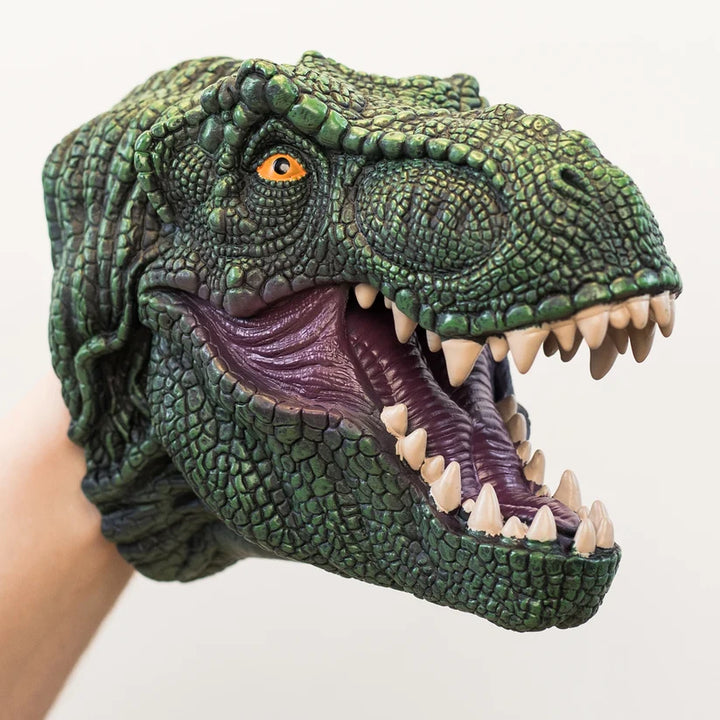 Dinosaur head hand puppet with open mouth on a white background