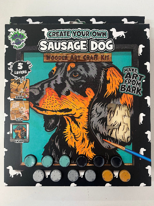 Wooden art craft kit with a dog illustration on a black background layered puzzle