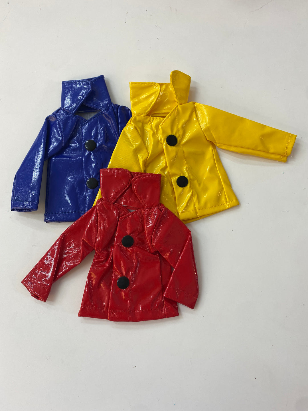 elf on shelf raincoat